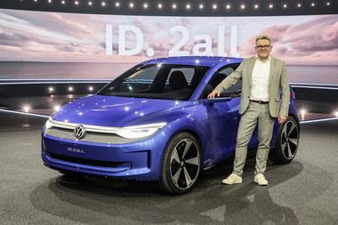 Andreas Mindt, VW head of design, with ID. 2all concept in Hamburg
