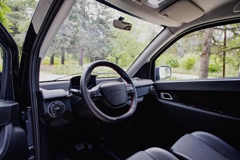 Full dashboard interior shot of S04 revealing dashboard, TFT, steering wheel and partial view of seats from driver POV